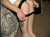 HEATHER IS F0RCED TO TAPE UP HER LEGS AND BARE FEET & IS THEN PANTY STUFFED AND WRAP GAGGED THEN HOG-TIED WITH TAPE ON THE BED (D52-14)
