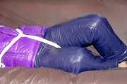 Pia tied and gagged with ropes and a ballgag with eye patches wearing a sexy crazy sensation down pants and a purple down jacket (Pics)