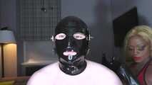 Huge rubber hands in the gimp’s mouth