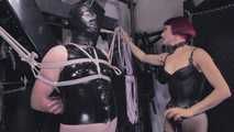 Mistress Tokyo - slave on the cross in latex with CBT