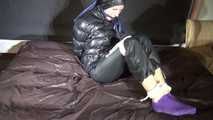Ronja being tied and gagged with ropes and a ballgag in shiny nylon rainwear and downwear (Video)