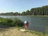 Watch Chloe enjoying her shiny nylon Shorts outside at a sunny Day