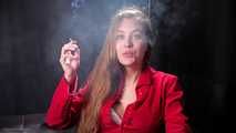 Lady in red Ksenia is smoking sitting on the sofa
