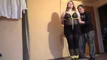 Sandra tied with yellow ropes 3/4