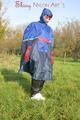 Jill wearing supersexy shiny nylon rainwear and a rain cape posing outdoor in the field (Pics)