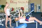 Katharina and a friend of her during their workout in the gym both wearing sexy shiny nylon shorts and tops (Pics)