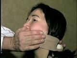 25 YEAR OLD ASIAN MAI-LING IS BALL-TIED, MOUTH STUFFED, BAREFOOT, TOE-TIED, FOOT TICKLED, WRAP ACE BANDAGE GAGGED & CLEAVE GAGGED (D56-1)
