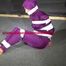 Sexy Sandra wearing a supersexy purple shiny nylon rainsuit bein tied and gagged and hooded on the floor with tape (Video)