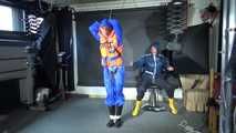 See Ronja tied and gagged by Stella in shiny nylon Rainwear and a Life Vest!