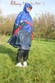 Jill wearing supersexy shiny nylon rainwear and a rain cape posing outdoor in the field (Pics)