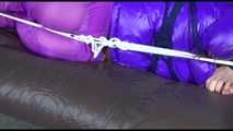 ***HOT SANDRA*** tied, gagged and hooded with ropes and a cloth gag on bed wearing a sexy purple shiny nylon down jacket and a rain pant (Video)