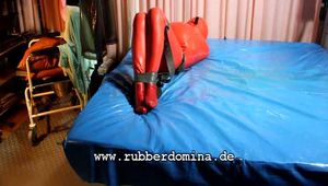 Red rubber Latex bondage suit