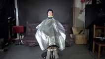 See Ronja tied and gagged on a Barber Chair in shiny nylon Rainwear and a shiny cape!