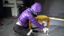 Watching Sonja wearig a sexy blue rainpant and a purple down jacket being tied, gagged and hooded on a stool with ropes and a cloth gag (Video)