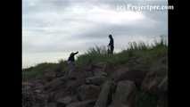 007001 Kim Takes Her First Pee Of The Day On The Rocky Beach