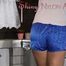 Watching sexy Pia wearing a sexy blue shiny nylon shorts and a tshirt doing her housework (Pics)