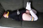 Kitty Quinzell in Ziptied on the Sofa