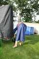 Watch Sandra in the Garden wearing a Rainskirt and Rainjacket