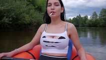 Lera is sailing on the air boat and smoking