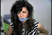 35 YEAR OLD ITALIAN HAIRDRESSER IS CLEAVE GAGGED, MOUTH STUFFED WITH PANTIES, HANDGAGGED, WHILE TIGHTLY TIED TO A CHAIR (D74-14)