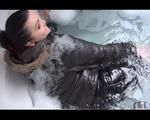 Jill Diamond wearing a supersexy black rain pants and a darkgreen down jacket in the bathtub (Video)