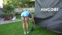 Watch Maly in her shiny nylon Shorts enjoying the warm Weather in the Garden