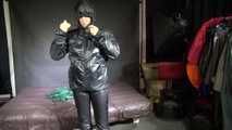 Watching sexy Sandra putting on several layers of shiny nylon rainwear including hoods and enjoy the feeling (Video)