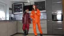 Miss Petra and Lady Nadja in AGU raingear (original AGU) and an exclusiv orange Adidas AGU raincoat