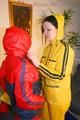Jill and a friend of her wearing shiny nylon rainwear and having fun with eachother (Pics)