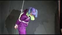 MARA tied and gagged overhead with ropes and a cloth gag wearing a super sexy super shiny purple rainsuit and blue rubber boots (Video)