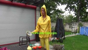 Watch Pia enjoying her shiny nylon Rainwear