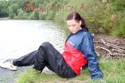 Enni outdoor wearing shiny nylon shorts rain pants and rain jacket (Pics)