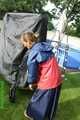 Watch Sandra in the Garden wearing a Rainskirt and Rainjacket