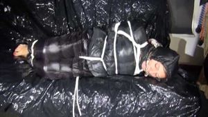 Get a Video with Sandra enjoying Bondage in her Shiny Nylon Downwear from our 2016 Archive