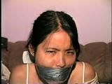 24 Yr OLD ASIAN VIETNAMESE DAISY IS WRAP TAPE GAGGED, BALL-TIED, TOE-TIED, BLINDFOLDED & TRIES TO MAKE CALL (D44-4)