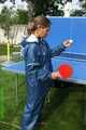 Watch Sandra playing table tennis in her shiny nylon Rainwear