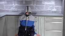  Miss J ziptied in raingear and gagged with inflatable gag