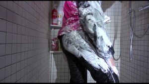 Mara wearing a sexy rainwear combination for taking a shower with shaving cream (Video)