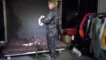 Watching sexy Pia wearing a sexy black shiny nylon jumpsuit reordering rainwear (Video)