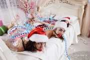 [From archive] Lucky, Nelly, Xenia - Santa’s little helpers hogtied and wrapped up on a bed 2