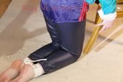 Mara tied and gagged and hooded on a chair wearing sexy shiny nylon shorts over a rainpants and a rain jacket (Pics)