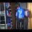 Sonja wearing a sexy black shiny skinny pant and a shiny blue down jacket trying on several shorts (Video)