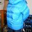 Jill tied and gagged in a refrigeration room wearing a blue shiny nylon down jacket and a black rain pants (Pics)