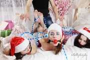 [From archive] Lucky, Nelly, Xenia - Santa’s little helpers hogtied and wrapped up on a bed 2