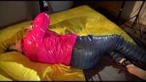 Get an archive Video with Lucy bound and gagged in her shiny nylon downwear