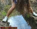 004014 Amber Attempts To Top Up A Big Puddle And Ends Up With Wet Feet