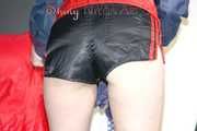 HOTHOTHOT DESTINY folding clothes wearing high heels and a shiny nylon shorts and a rain jacket (Pics)