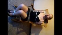 Tied up and gagged in a rocking chair