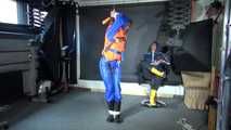 See Ronja tied and gagged by Stella in shiny nylon Rainwear and a Life Vest!