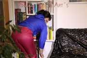 Sexy Mara wearing a sexy purple shiny nylon pants and a blue shiny nylon jacket during dedusting the shelf (Pics)